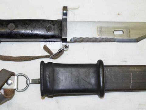 AKM sawback/wire cutter Bayonet with scabbard and frog and hand lanyard.