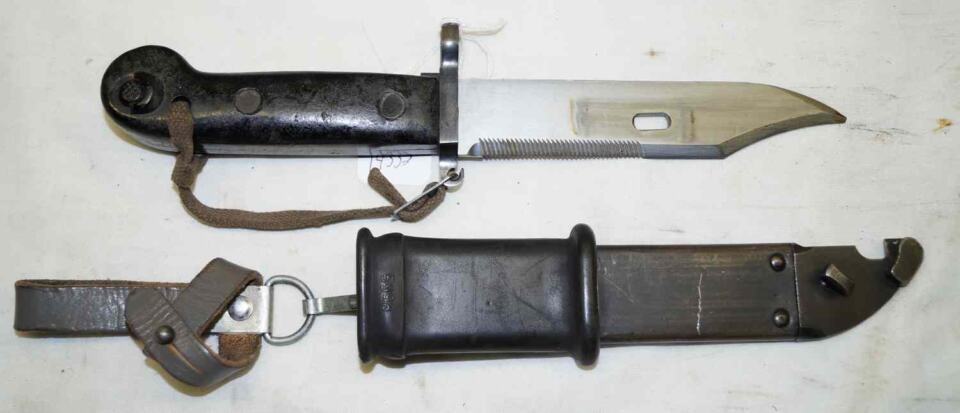 AKM sawback/wire cutter Bayonet with scabbard and frog and hand lanyard.