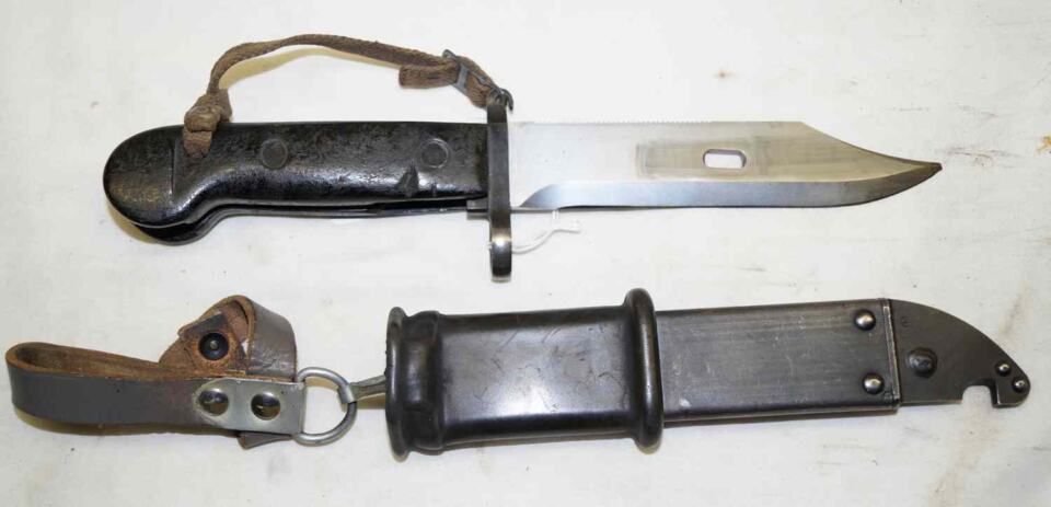 AKM sawback/wire cutter Bayonet with scabbard and frog and hand lanyard.