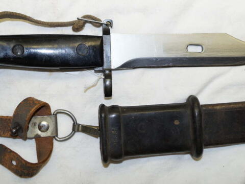 AKM sawback/wire cutter Bayonet with scabbard and frog and hand lanyard.