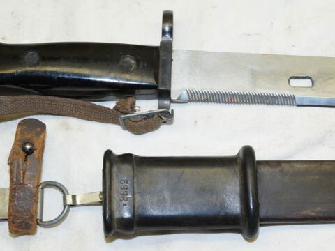 AKM wirecutter, sawback bayonet with scabbard and frog and hand lanyard.
