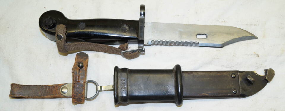 AKM wirecutter, sawback bayonet with scabbard and frog and hand lanyard.