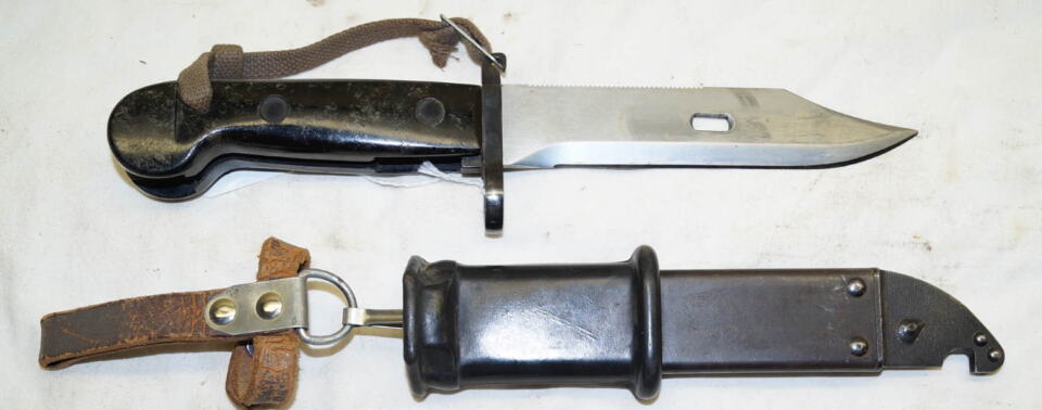 AKM wirecutter, sawback bayonet with scabbard and frog and hand lanyard.