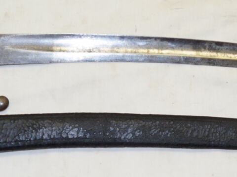 Comblain Cadet bayonet with leather scabbard remnant.
