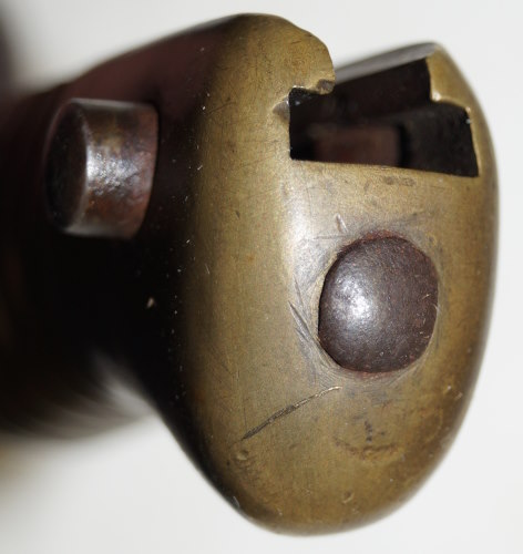 Comblain Cadet bayonet with leather scabbard remnant.
