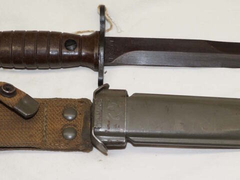 Italian produced M4 bayonet with PLASTIC scabbard and grips.