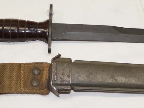 Italian produced M4 bayonet with PLASTIC scabbard and grips.