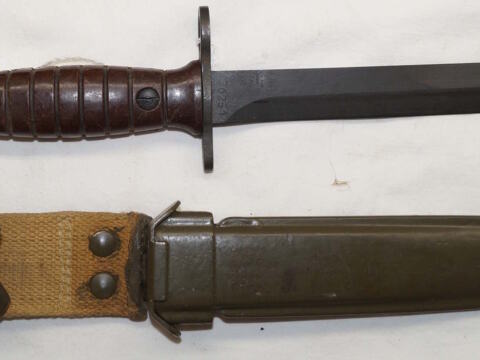 Italian produced M4 bayonet with PLASTIC scabbard and grips.