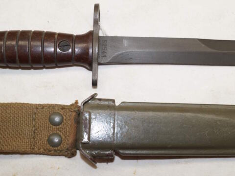 Italian produced M4 bayonet with PLASTIC scabbard and grips.