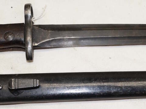 FN49 double edged bayonet with scabbard.